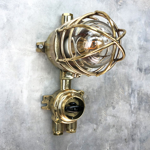 outdoor steampunk wall light with cage and isolator switch