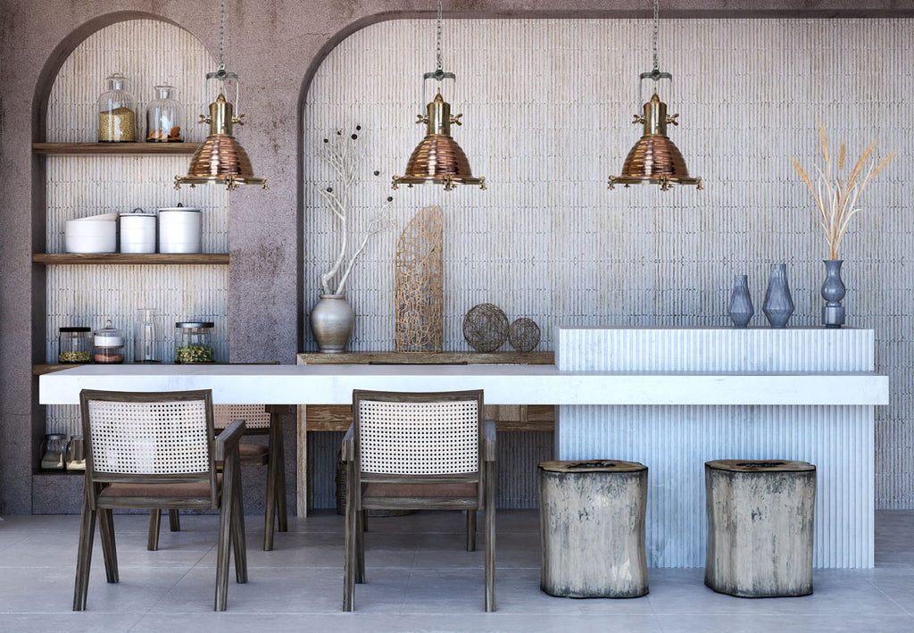 vintage industrial lighting in a kitchen diner over a large kitchen island