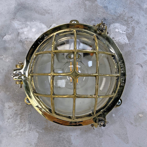 vintage brass circular bulkhead wall light for loft conversion