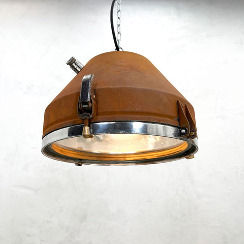 Rusted industrial style bakery ceiling lighting idea