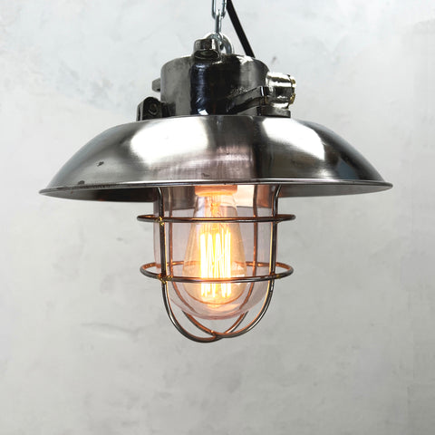 Industrial cage light for vaulted or tall ceilings