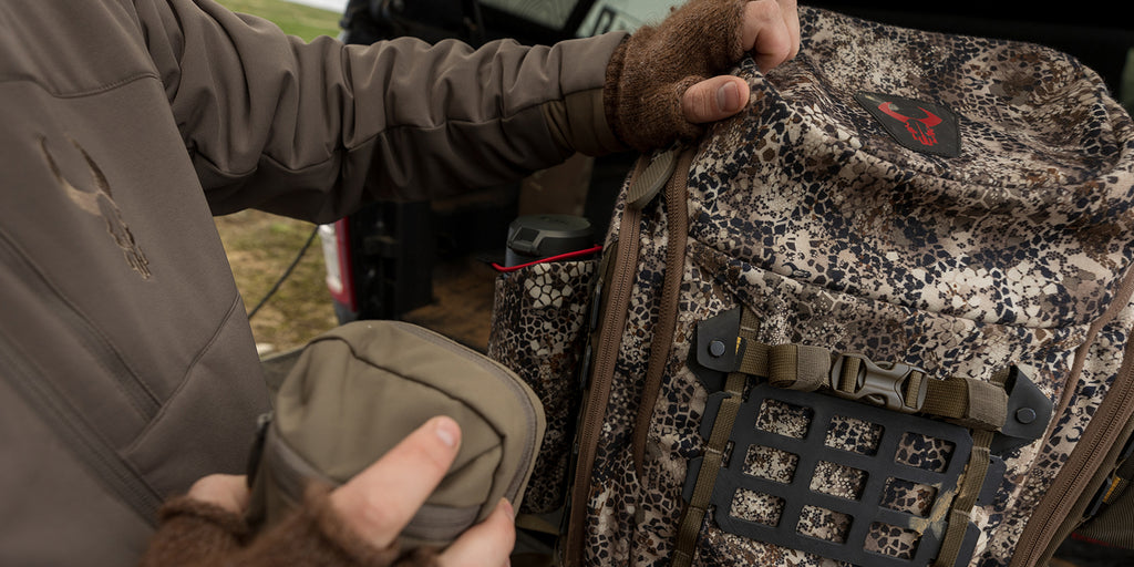 man adding pouched to Badlands grid system