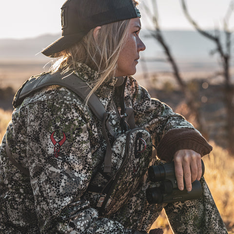 female hunter out in field