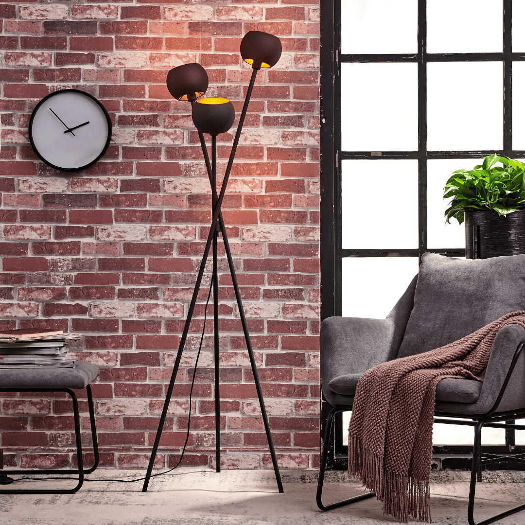 Black floor lamp in a cozy reading nook