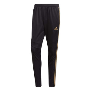 black and gold tiro pants