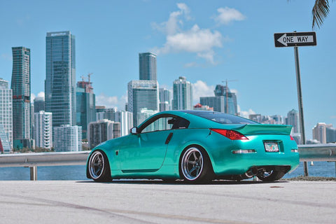 Nissan 350z with Cosmis Racing XT-006R 18x11 +8mm 5x114.3 Gunmetal Wheels