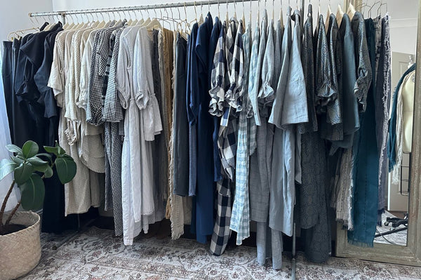 A clothing rack full of Eva Cassis ethically made garments