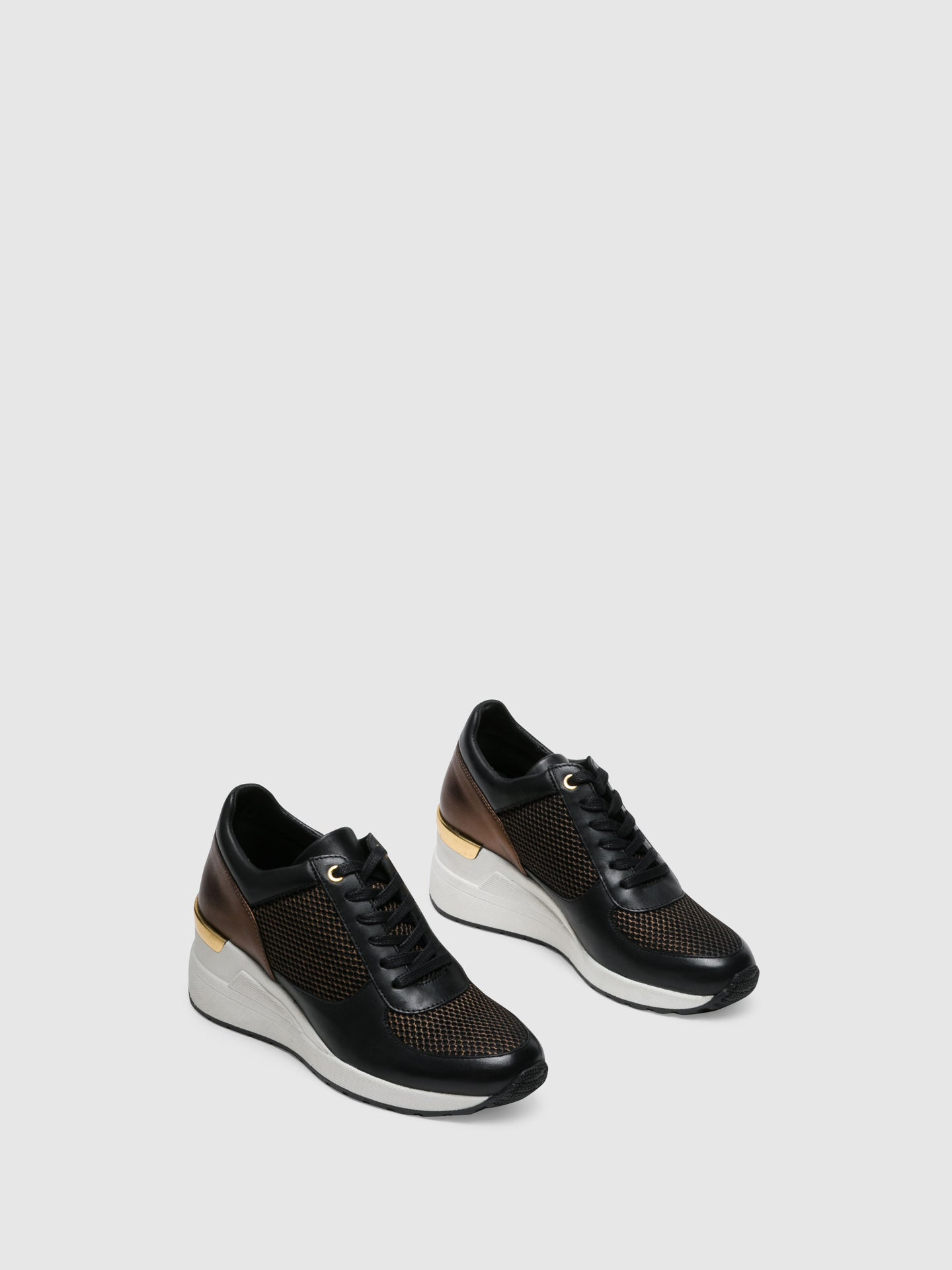 black wedged trainers