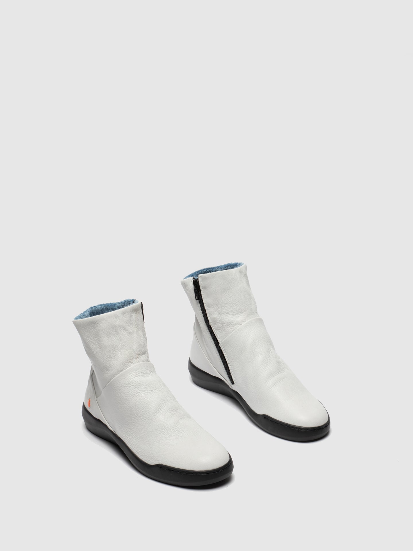 white zip up boots