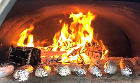 Baking Bread in a Traditional Wood Fired Bread Oven