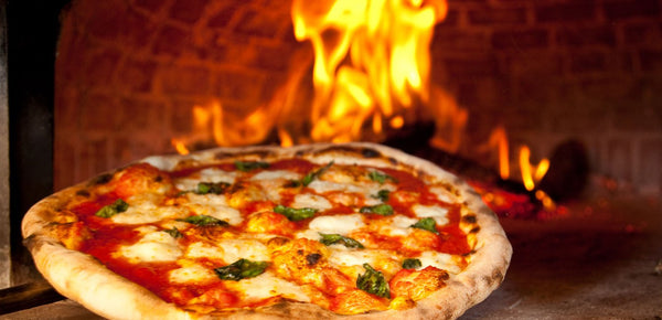 Smoky flavor in a wood fired pizza oven