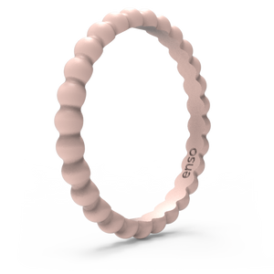 Image of Pink Sand Ring - Pale pink with peach tones.