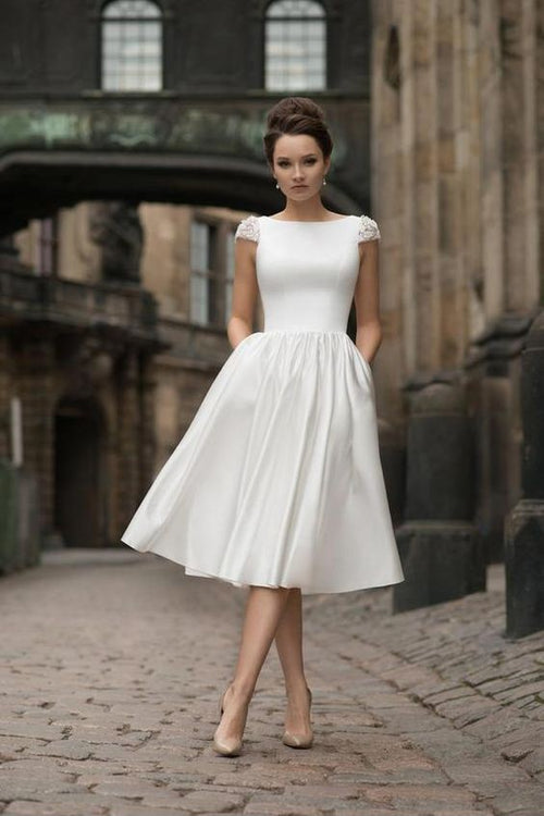 short white beaded wedding dress