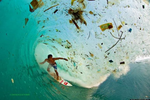 surfing-in-trash-filled-ocean-700x466