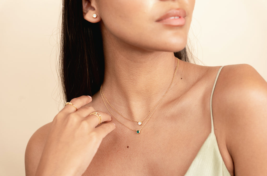 Dainty, delicate gold April Birthstone necklace from the Birthstone Collection. Minimalist jewelry made in America by Katie Dean Jewelry