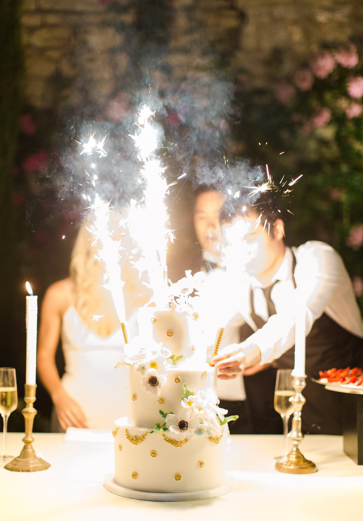 Katie Dean Jewelry romantic destination wedding at a chateau, Provence, France, cake sparklers