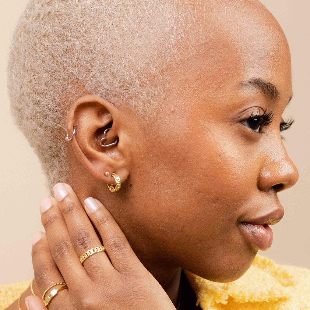 Model wearing Beaded Studs, demonstrating their versatile and subtle elegance