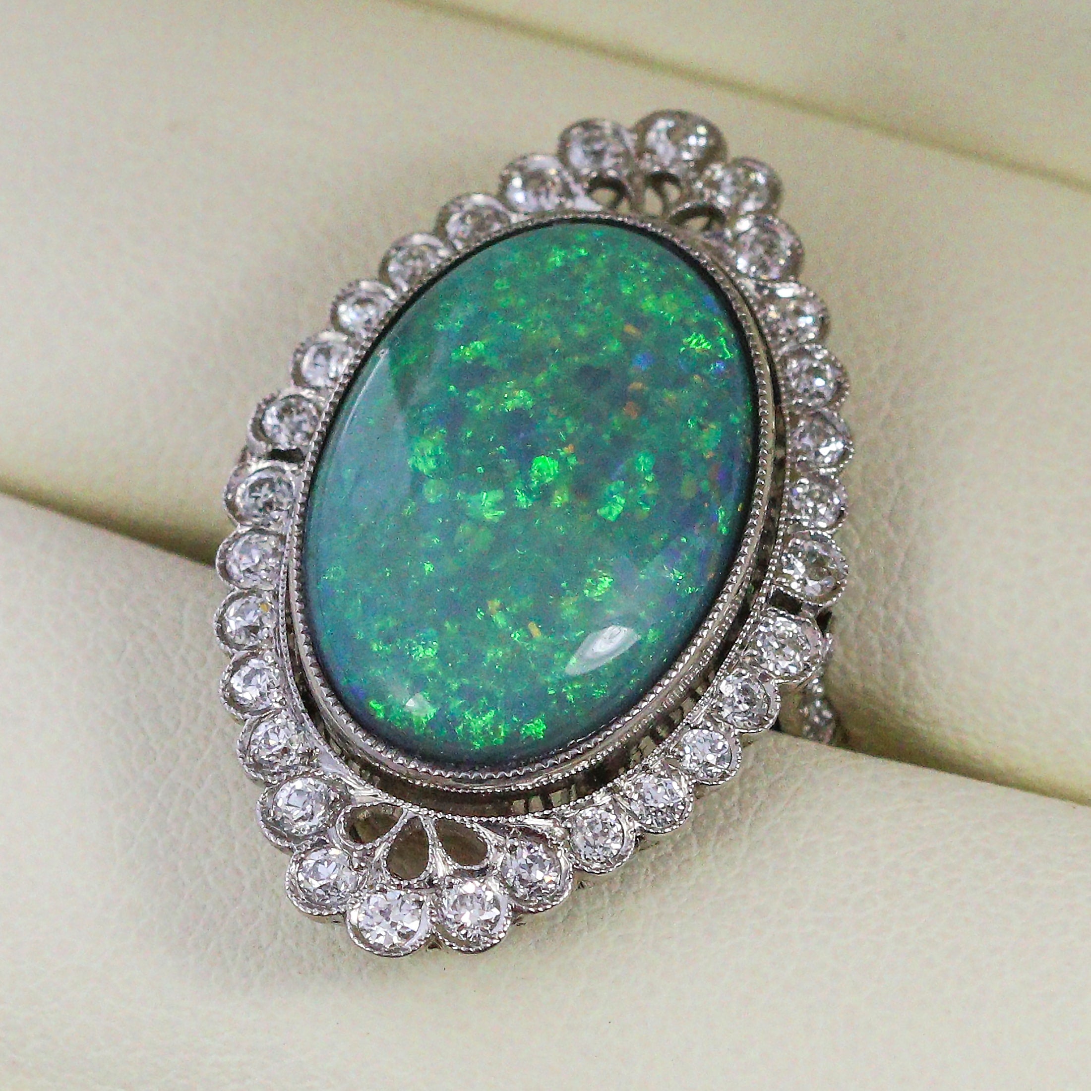 Black opal and diamond custom ring.