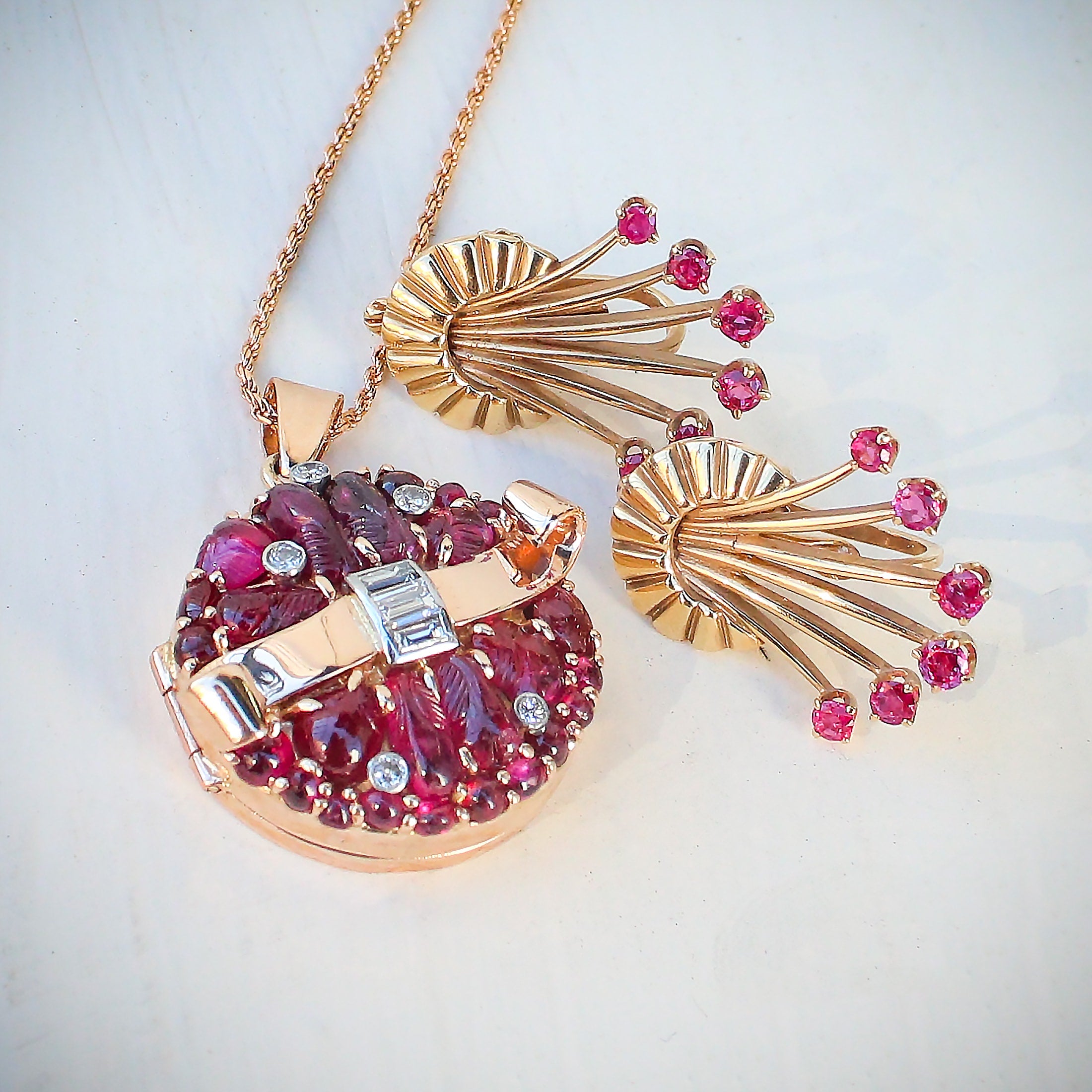 1940's retro rose gold ruby and diamond pendant earrings.