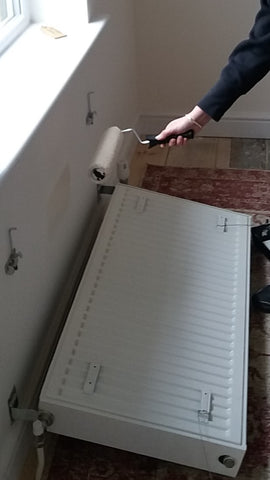 decorating behind a radiator 