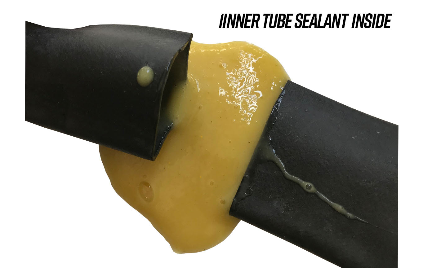 Cut open inner tube showing slime sealant inside