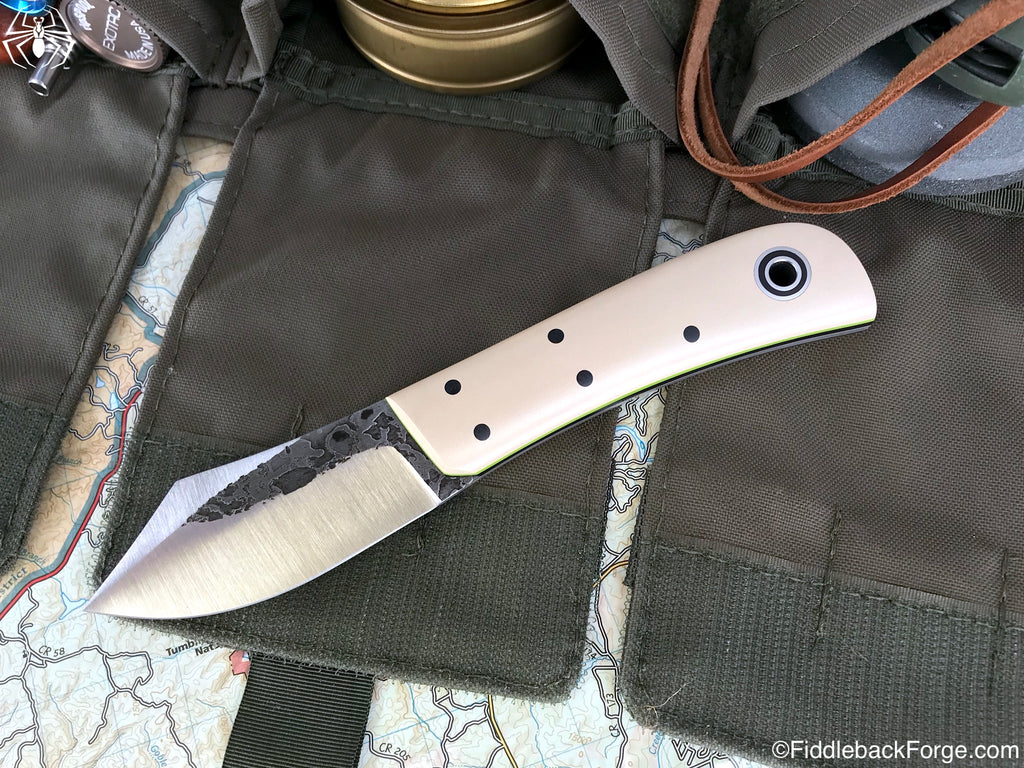 Fiddleback_Forge_-_Sylvrfalcen_-_White_Paper_Micarta02_1024x.jpg