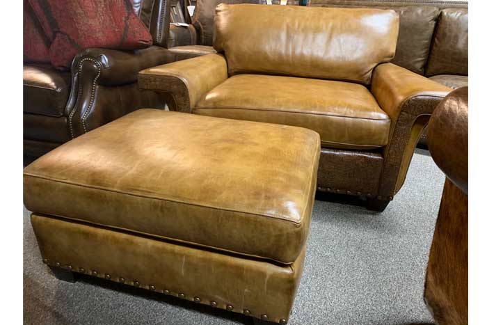leather sofa and chair and a half