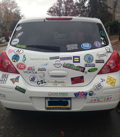 car covered in bumper stickers