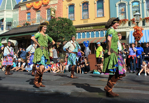 Disney performers dancing in the street.