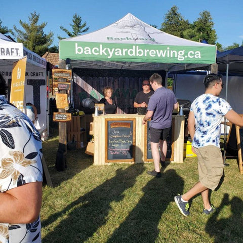 Backyard Brewing custom canopy tent at an event. 