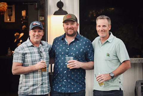 three men with beer