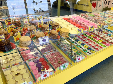 Eileen's Colossal Cookies store display with colorful, assorted cookies.