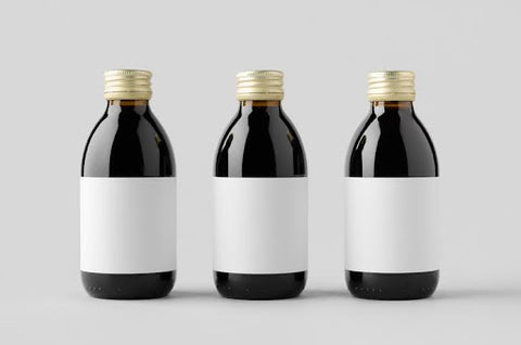 Three bottles with blank labels