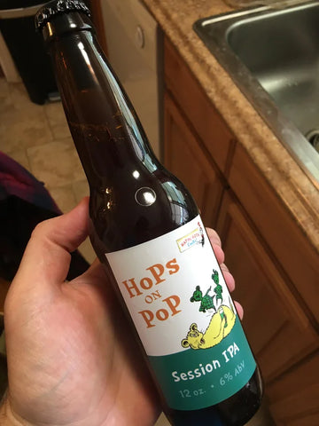 Hops on Pop homebrew beer with creative label.