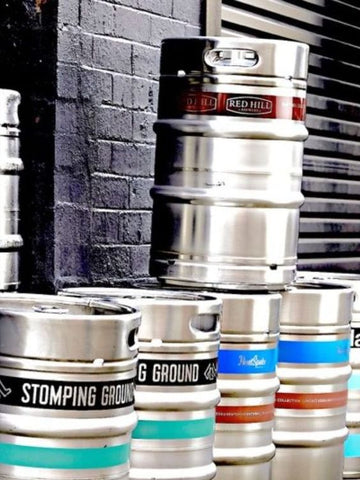Kegs with custom wraps and collars. 