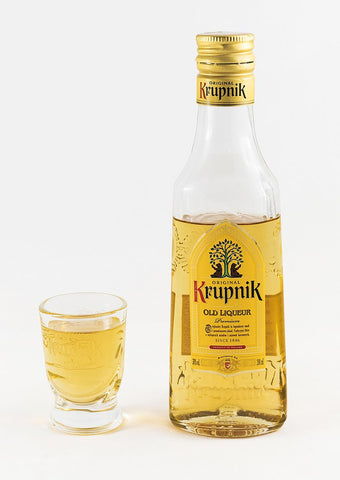 Krupnik Old Liqueur bottle with full glass.