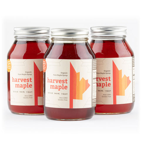 Maple syrup jars with custom labels.