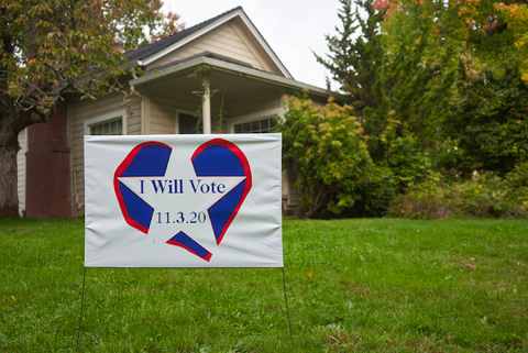 political yard sign in front of house