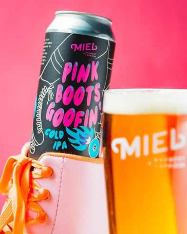 Miel Brewery Pink Boots Goofin' beer can in roller skate.