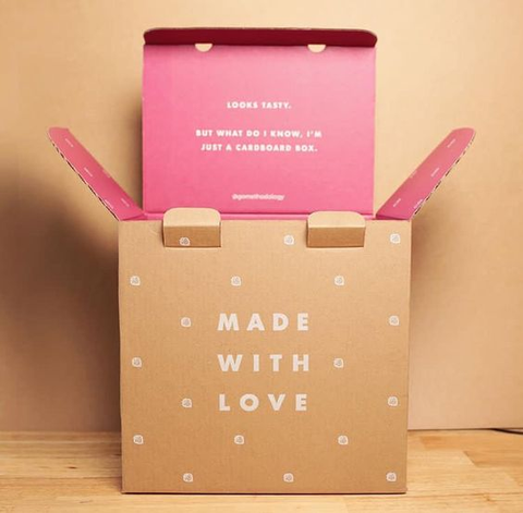 Open box that says "made with love."