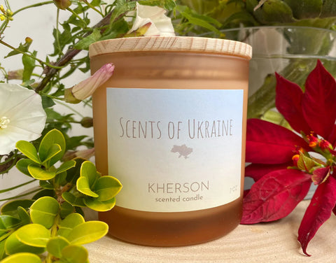 Scents of Ukraine Kherson candle with flowers.