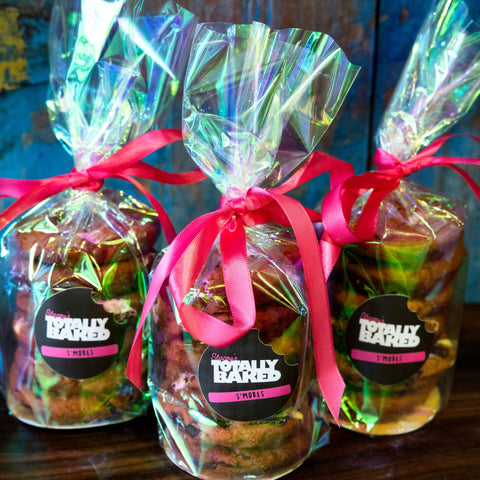 Stacey's Totally Baked s'mores cookies in bags with pink ribbons and custom labels.