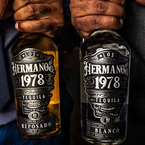 Two Los Hermanos Tequila bottles.