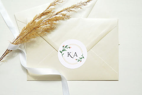 White envelope with wedding sticker seal.