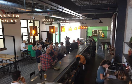 busy brewery taproom
