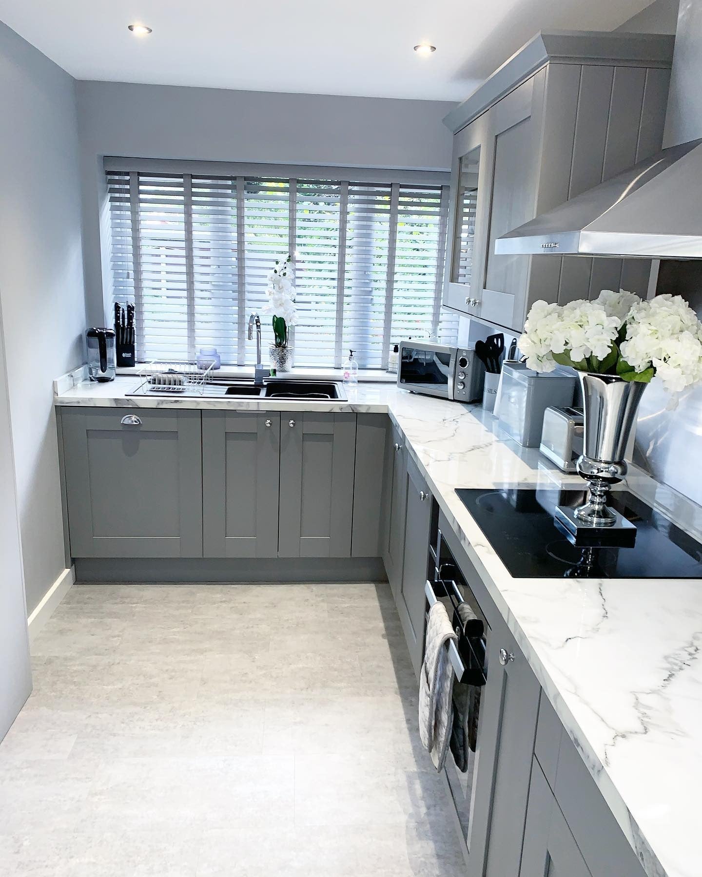 17. Structured Simplicity with a View - grey kitchen cabinets ideas