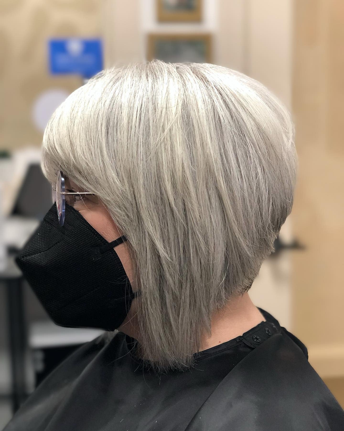 9. Silver Layered Angled Bob - Stacked Bob Hair