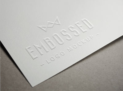 Embossed White Paper Logo PSD MockUp - Mockup Hunt