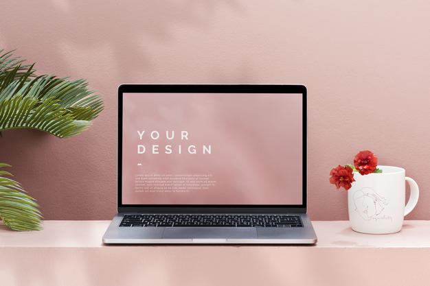 Laptop Mockup With A Pastel Pink Wall Psd - Mockup Hunt