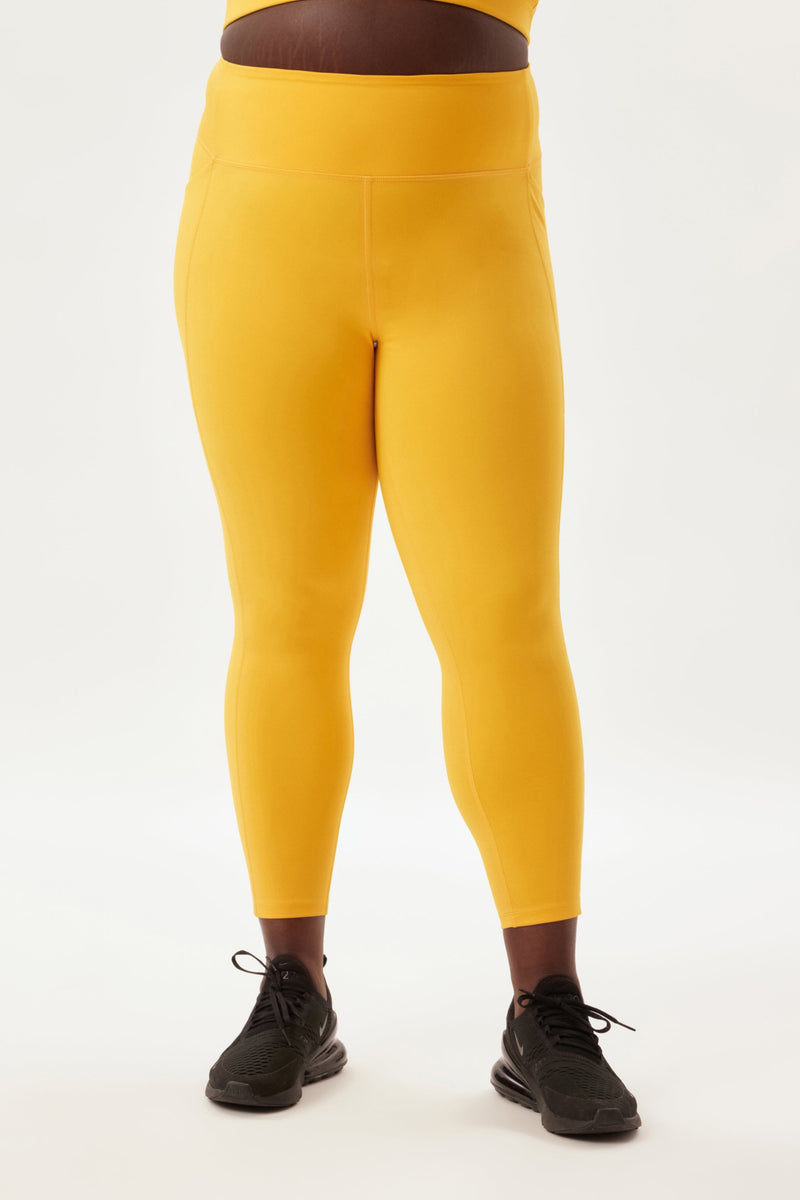 MICHI Women's Velocity Pocket Leggings, Fire Orange/Ivory, XS at   Women's Clothing store